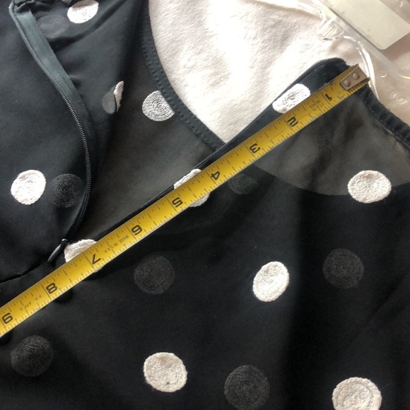 Sheer black and off white flared top with flared split sleeves. - Picture 6 of 11